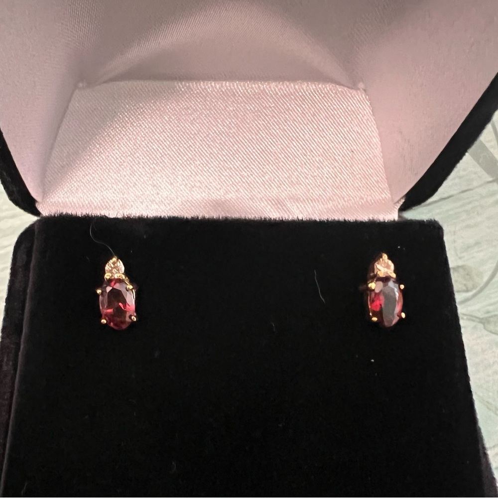 Cute earrings. Smoke amber colored stones with diamonds in 14k yellow gold.